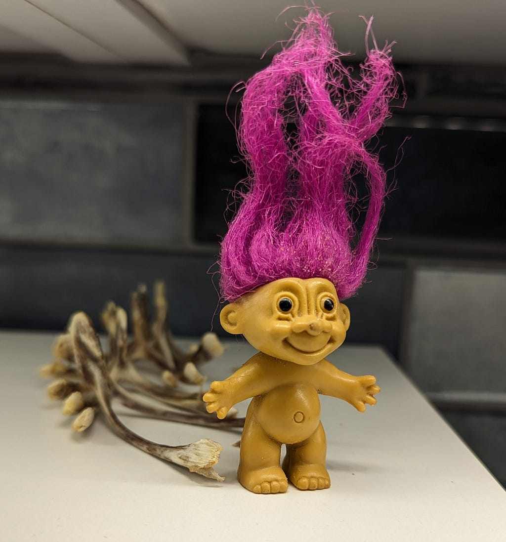 Toy troll on a shelf