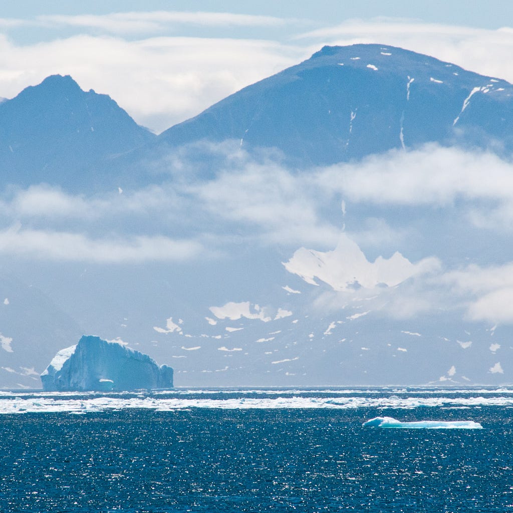 An iceberg drifts along near Ramah Bay in Torngat Mountains National Park in Labrador in northeastern Canada.