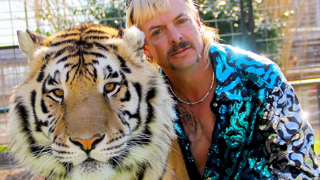 Tiger King’s Joe Exotic with one of his tigers