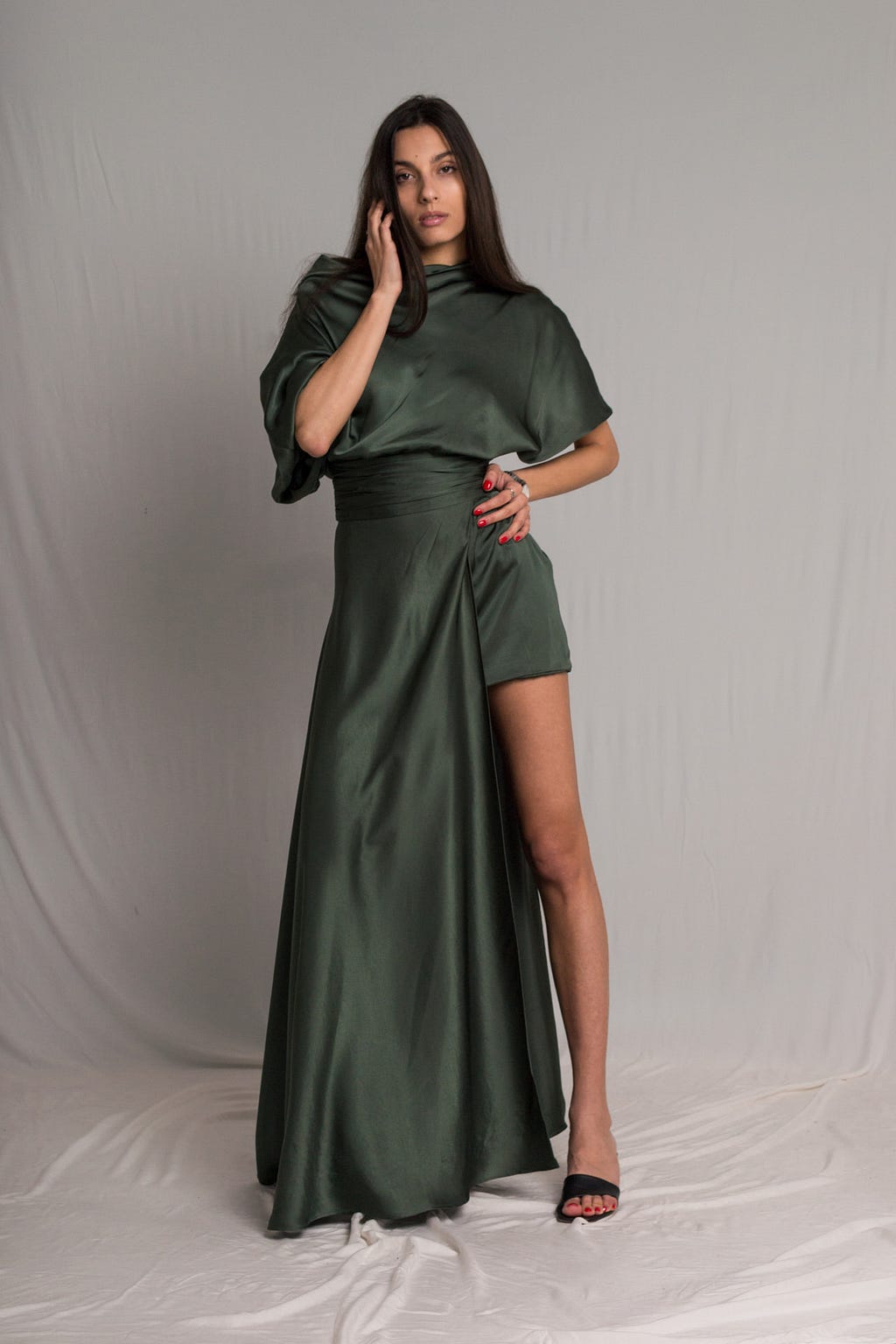 Bastet Noir made to measure olive satin dress with asymmetrical skirt, cowl neckline, pleated wist detail and a side zipper