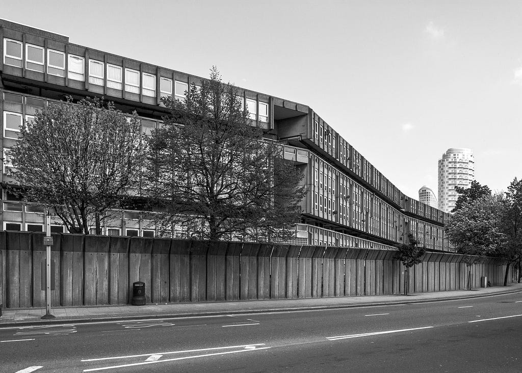 Black and white photograph of Robin Hood Gardens housing estate, concrete architecture