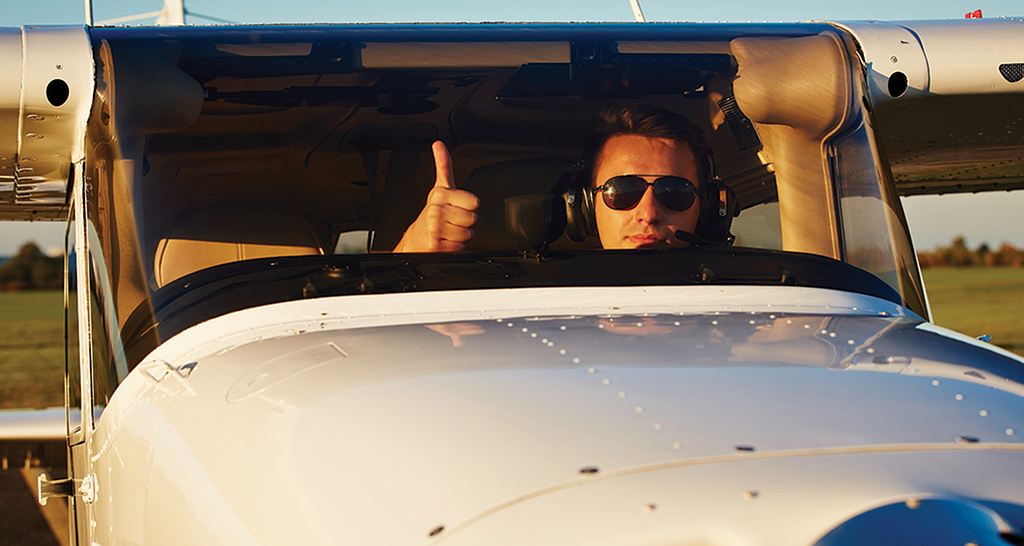 Photo of pilot giving the thumbs-up.