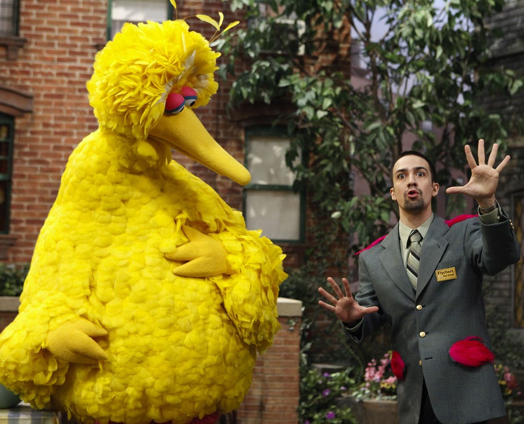 Lin Manuel-Miranda teaching Big Bird about habitats on Sesame Street