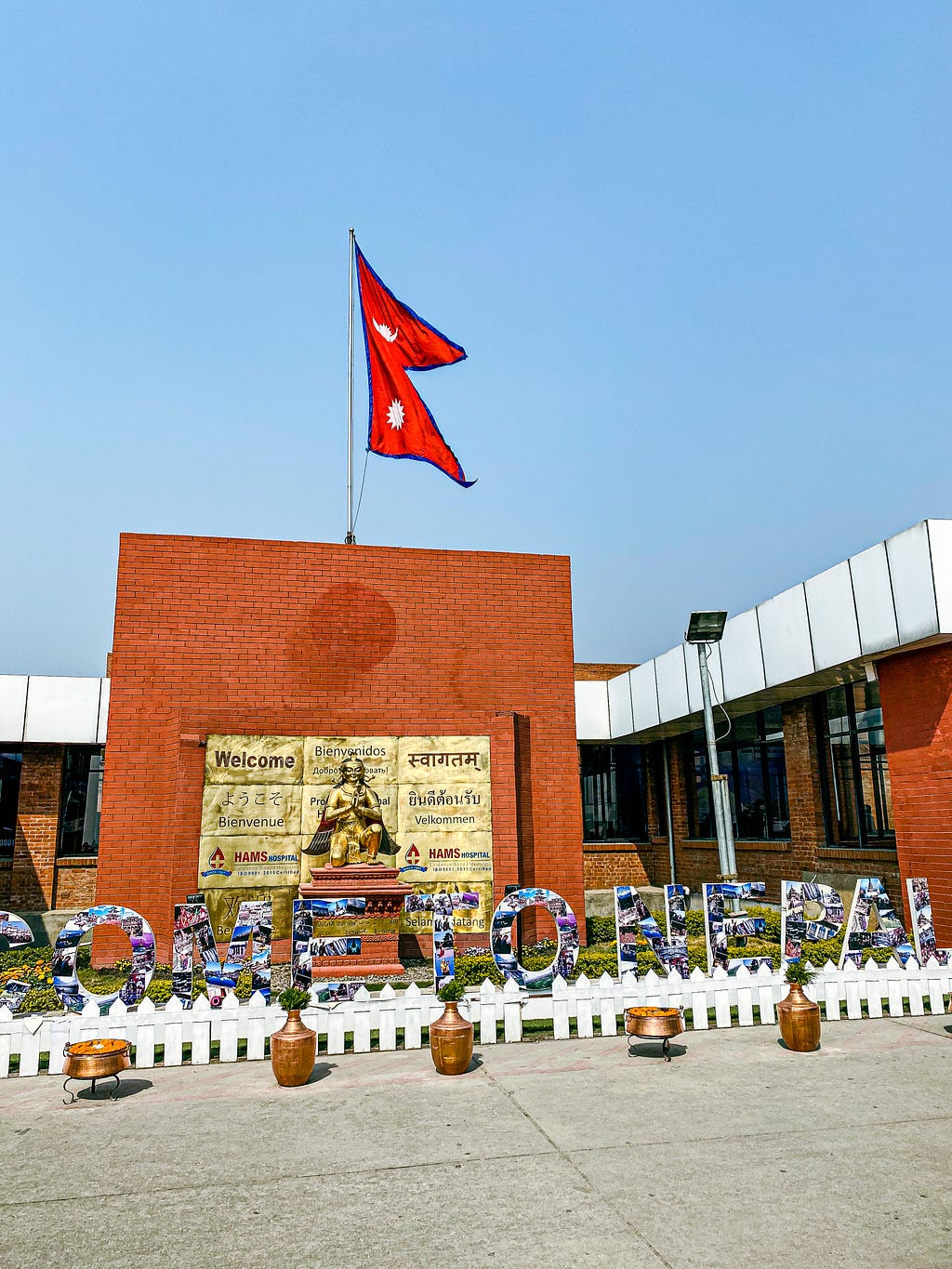 Welcome to Nepal display at Tribhuvan Airport. Photo by Author