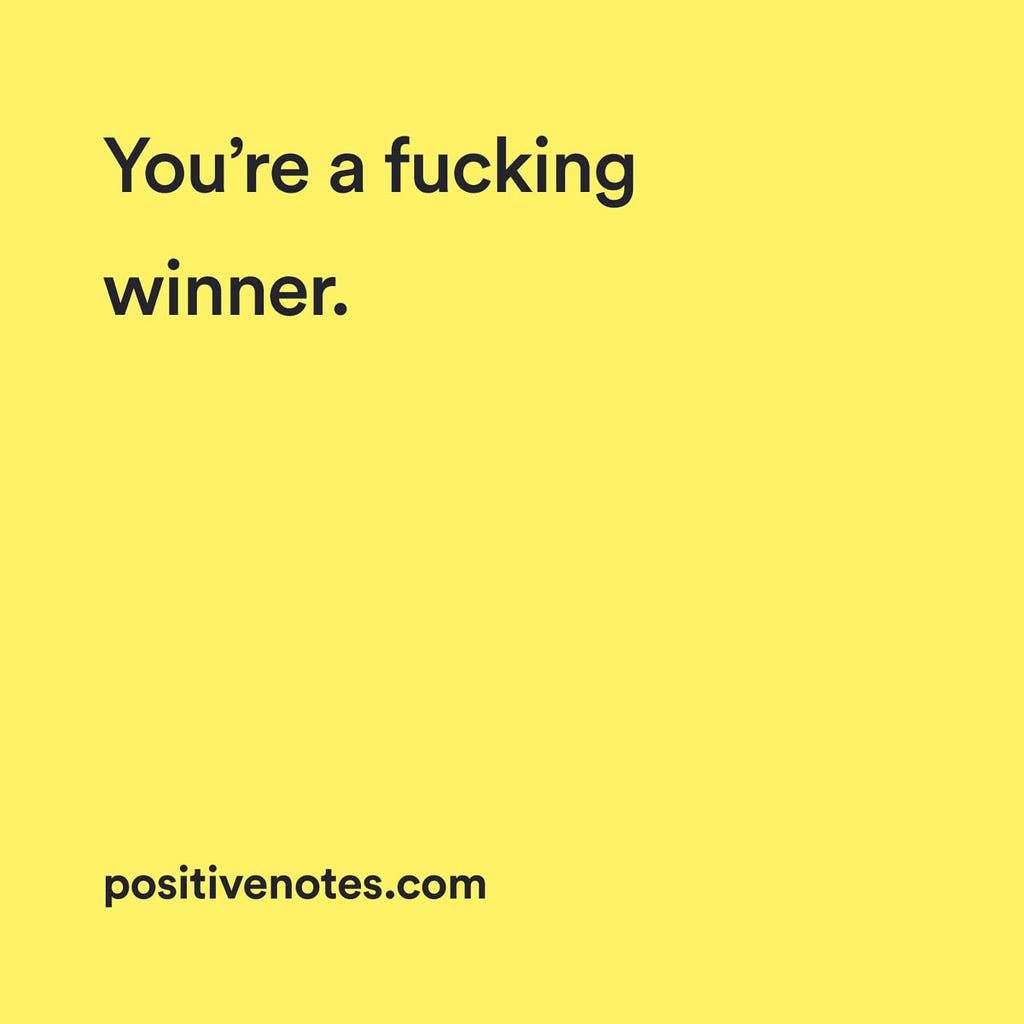 A yellow positivity card that says: “you’re a fucking winner”