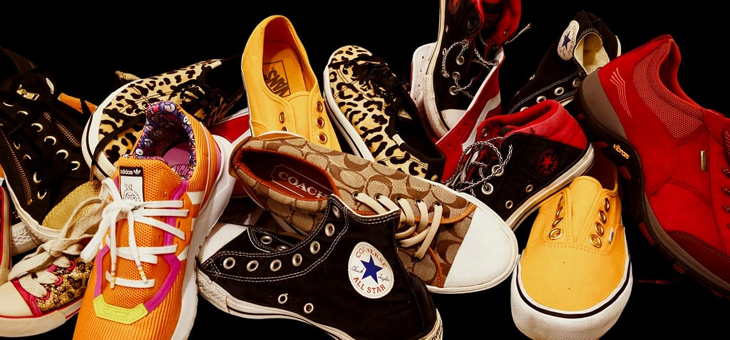 A photo of a jumble of colorful sneakers