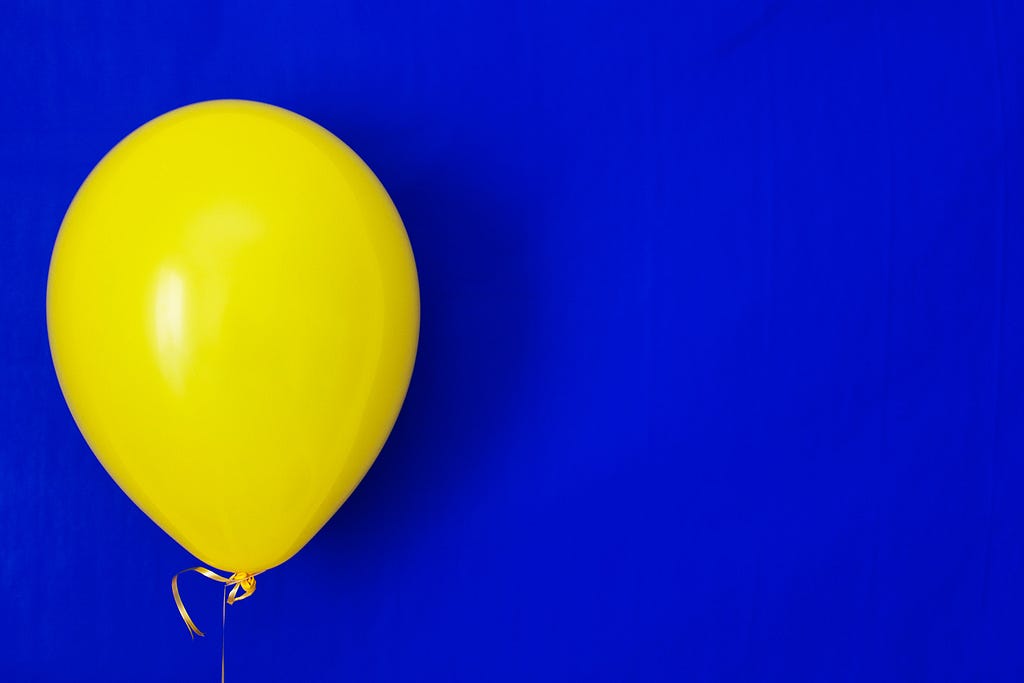 Yellow balloon on a blue background!