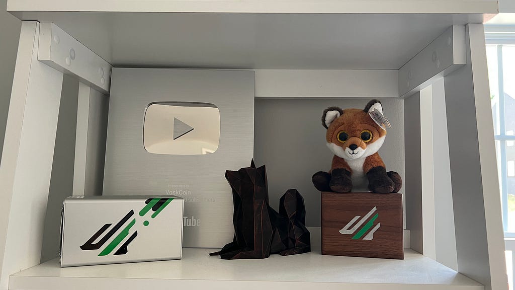 YouTube Silver Play Button, VoskCoin Miner, VoskCoin box, and Fox
