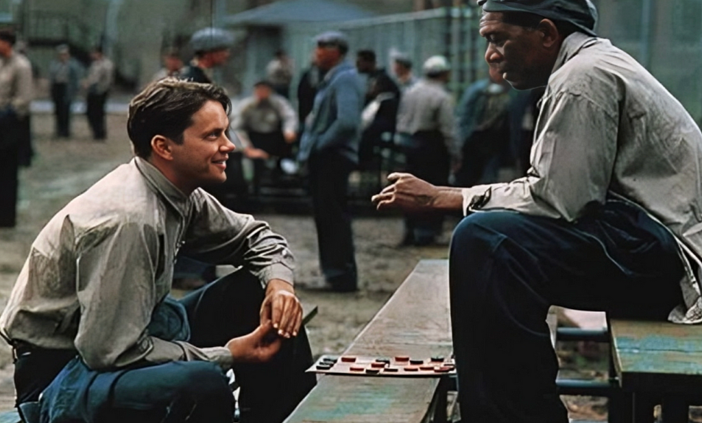 The Shawshank Redemption movie scene, a character talking to other character while both are sitting