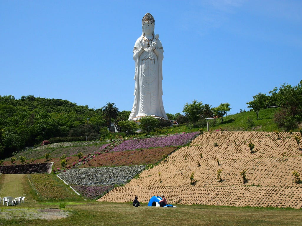 Kannon statue on top of a hillside in Japan