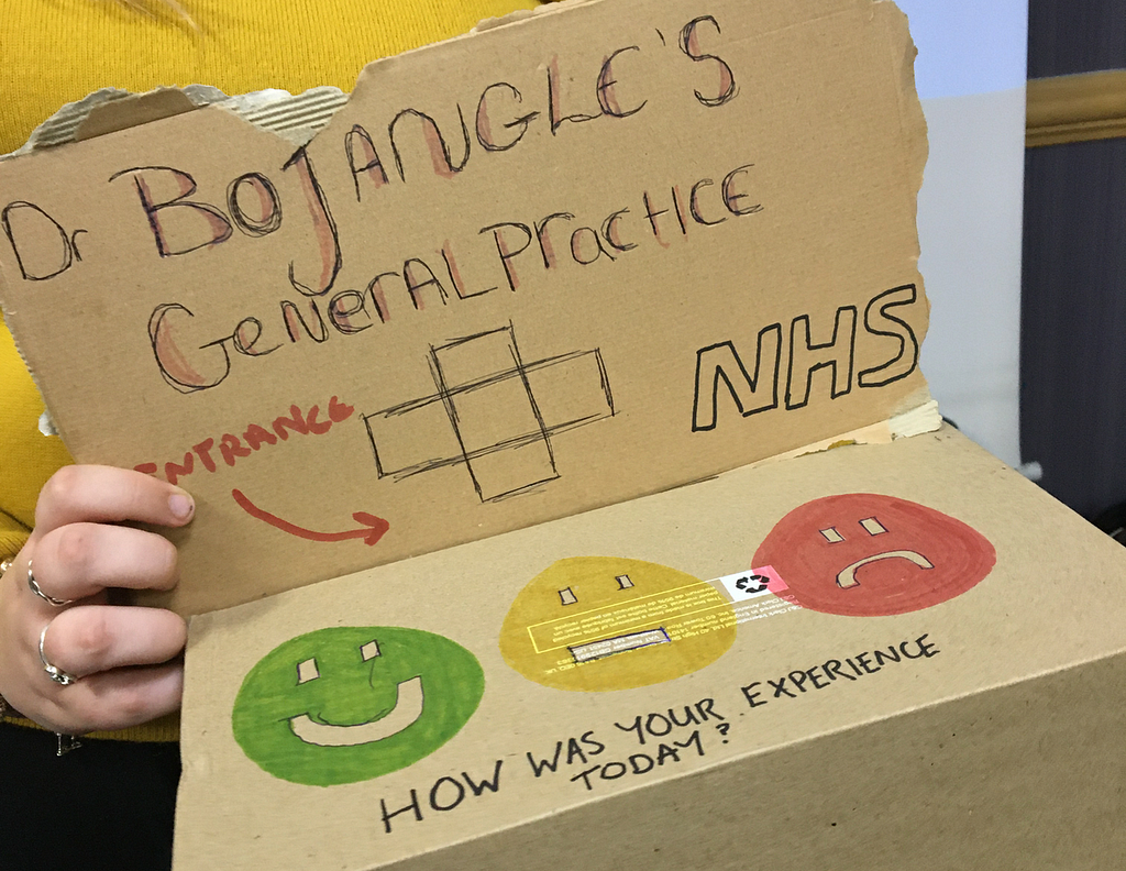 A cardboard prototype for a feedback device for GP waiting rooms