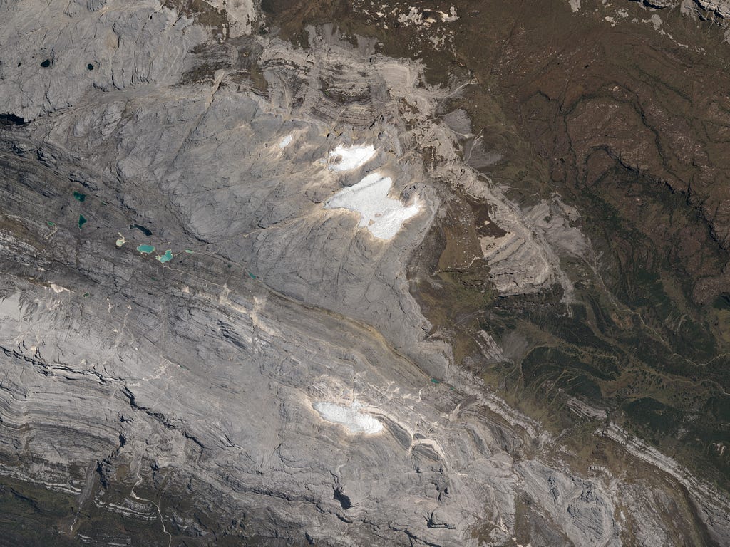 Satellite view of glaciers beneath the summit of Puncak Jaya, Indonesia.