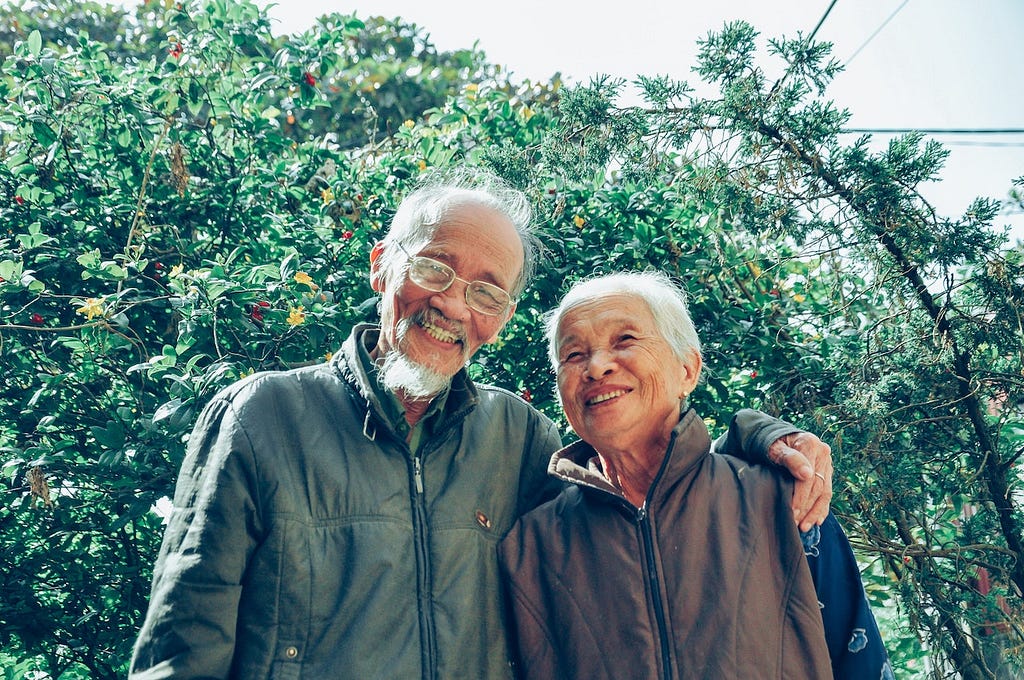 smiling older man and woman