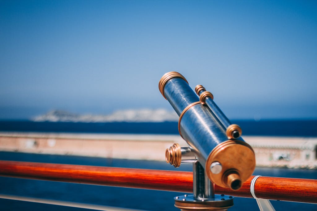 A telescope looks out onto the horizon.