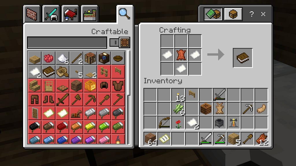 Two menus side by side: one shows the player’s inventory, full of random items; and the crafting table, a 3x3 grid. Another menu to the left shows a list of items the player can craft.