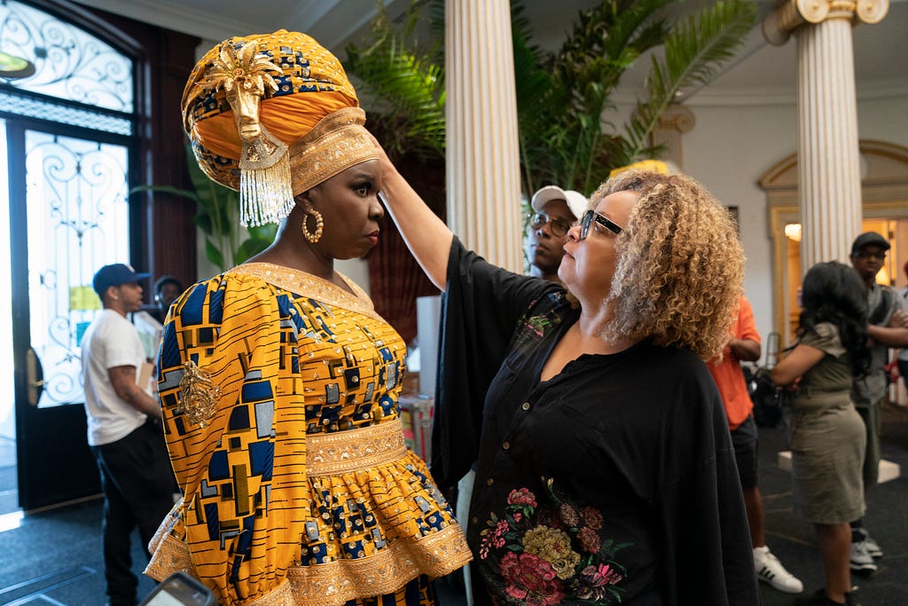 Ruth E Carter on the set of Coming 2 America, working on an incredible African costume design.