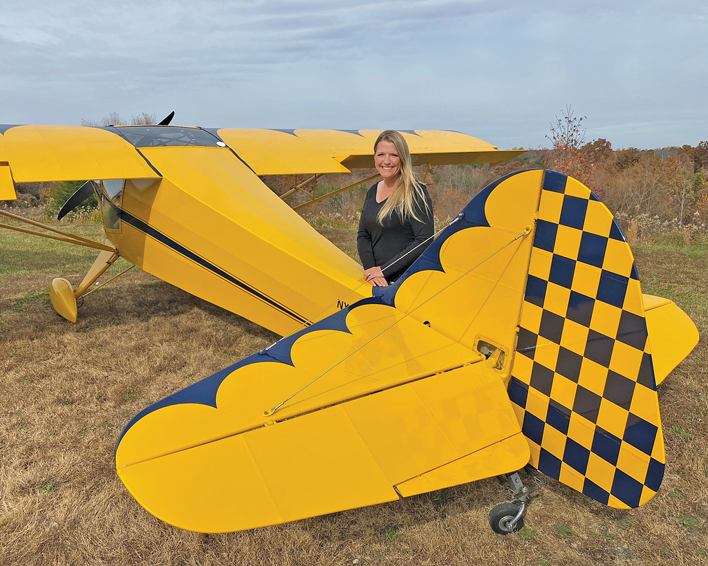 Photo of yellow airplane.