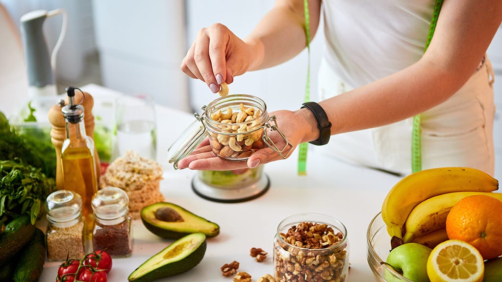 woman preparing healthy snacks