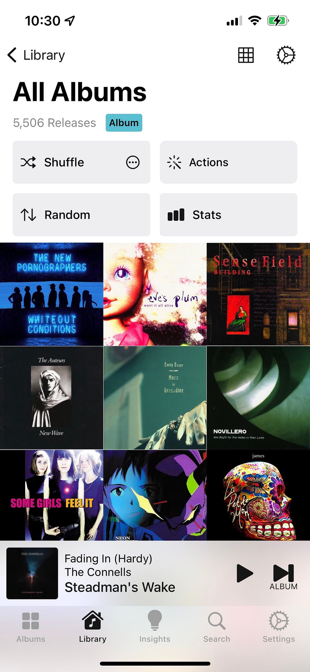 Library/All Albums in random order, in the Albums iPhone app.