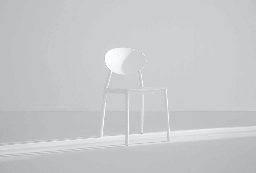 A white chair in a white background