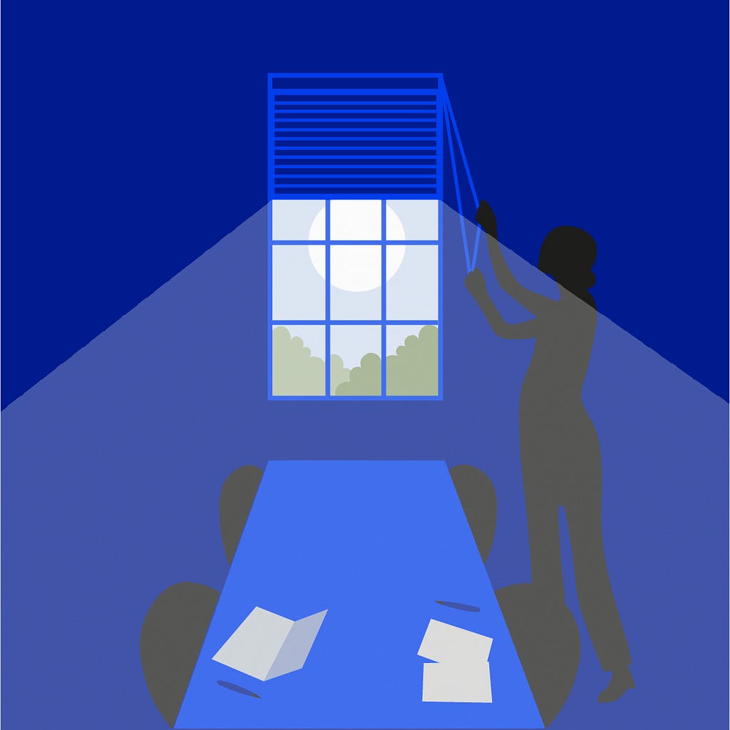 A human opening the blinds, letting natural light fill the dark office room