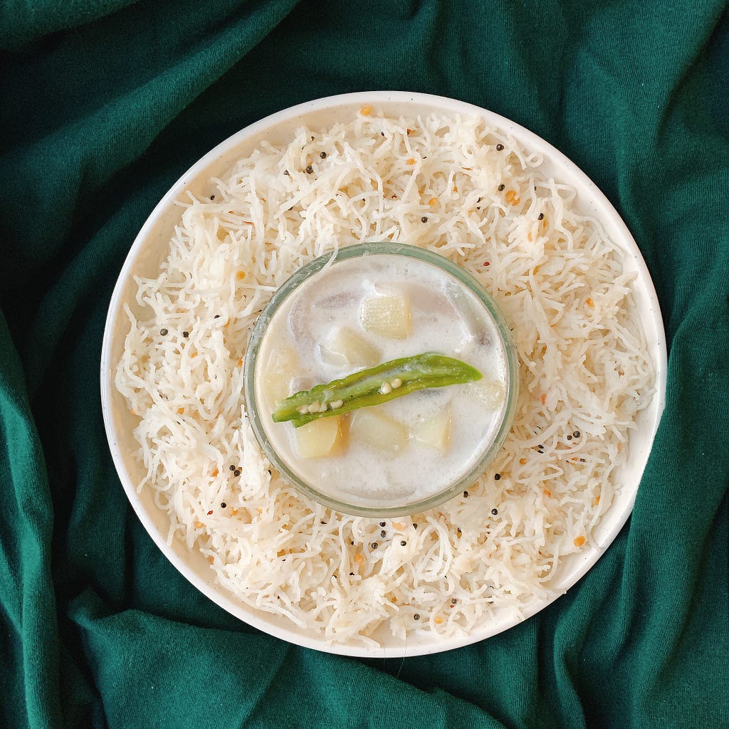 A Delicious SouthIndian Coconuty Ishtu Served with Tempered Rice Noodles or Sevai.