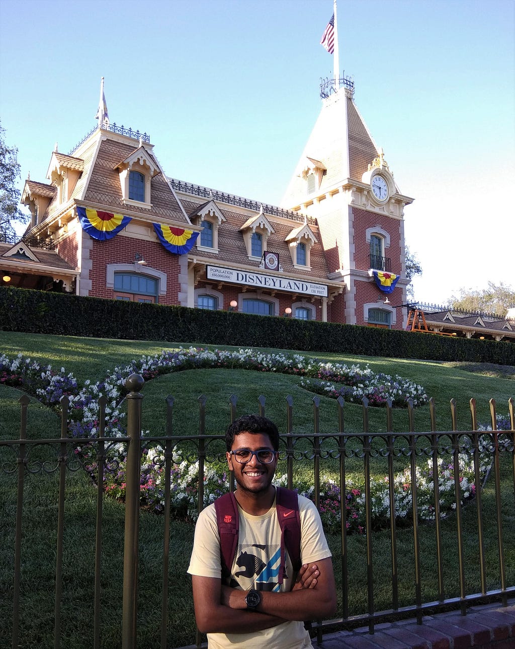 Posing in front of the Disneyland Main Station