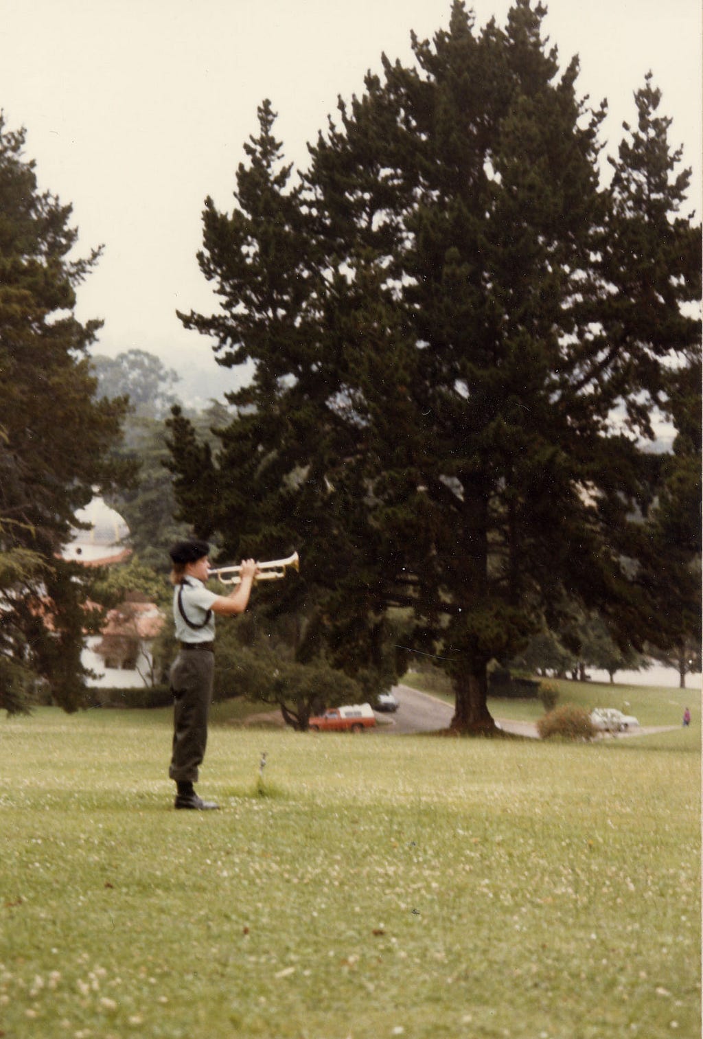 The author playing the trumpet at a Memorial Day service in her hometown, 1986