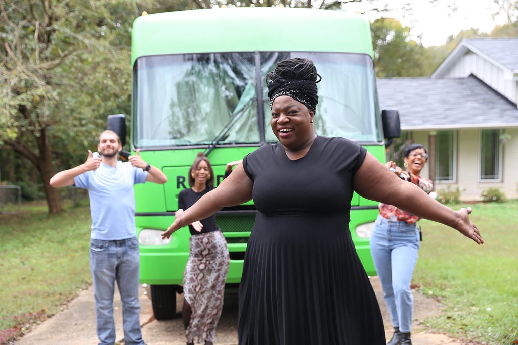 Tori Cooper, director of community engagement for the Transgender Justice Initiative at the Human Rights Campaign, poses in front of our green RV