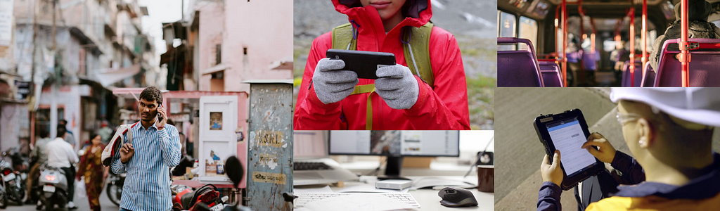 A man using a phone in the streets of India. Women holding phone with gloves on. Person using an iPad on a construction site