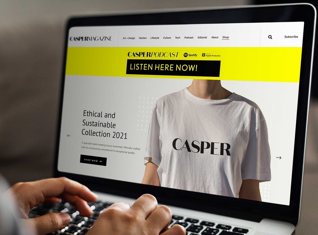 An image of a laptop open to Casper Magazine. The front page has a person wearing a t-shirt that reads ‘Casper’. To the left of the photo is the headline ‘Ethical and Sustainable Collection 2021’.