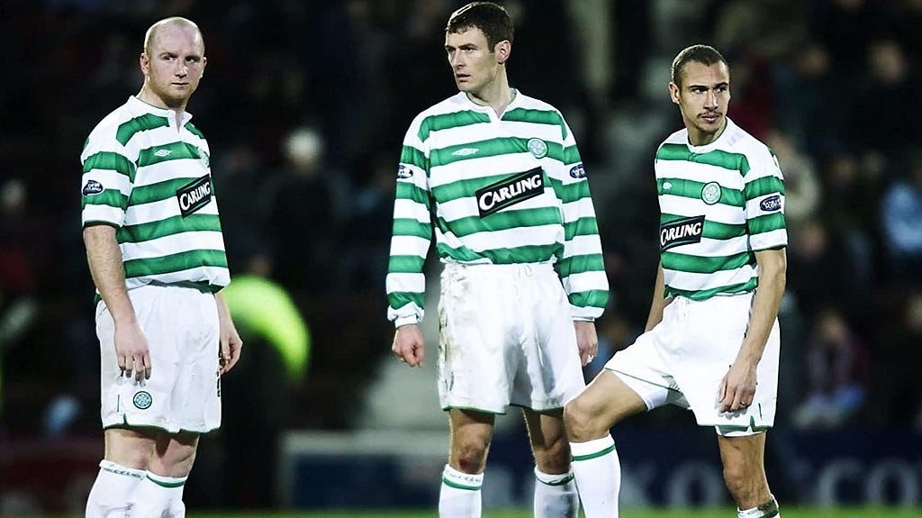 John Hartson, Chris Sutton and Henrik Larsson standing over the football