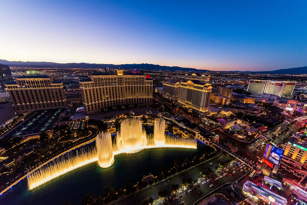 Las Vegas from above at night — photo courtesy of Rocker Sta and Unsplash.