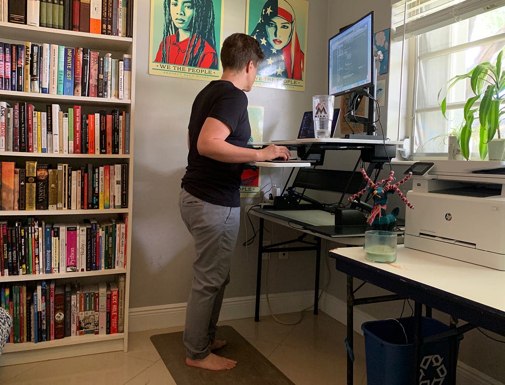 Rebekah working in her home office