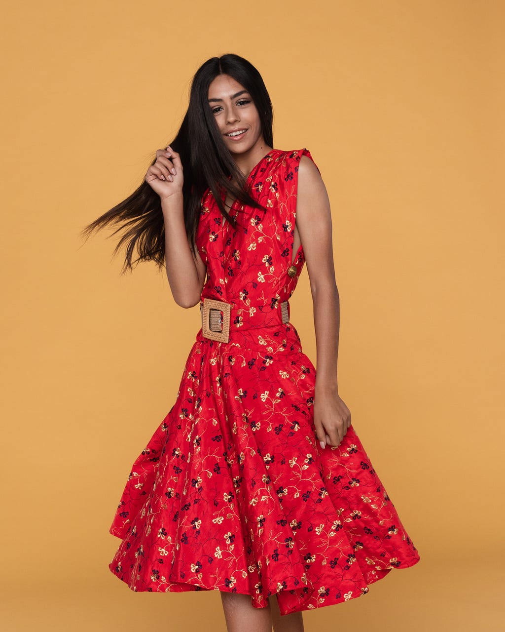 Girl in a red floral dress