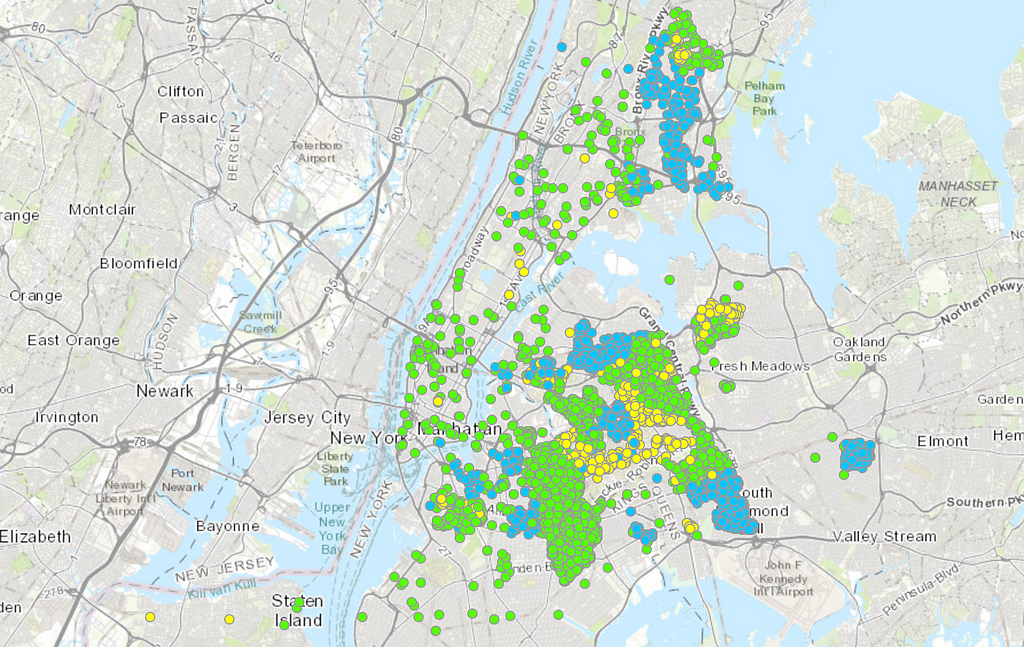 A map with green, blue and yellow dots showing the location of green infrastructure assets throughout NYC.