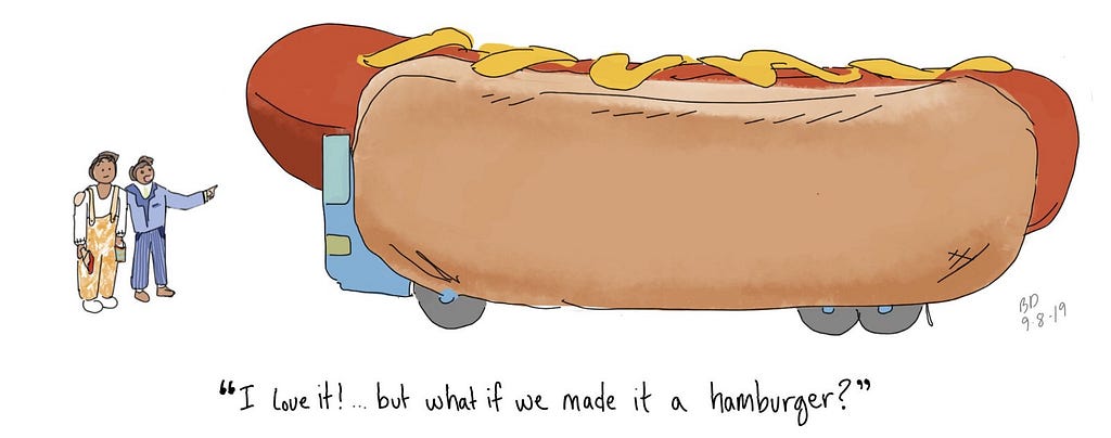 A manager and a worker stand next to a hotdog-shaped bus. The manager says “I love it! …But maybe we should try a hamburger?”