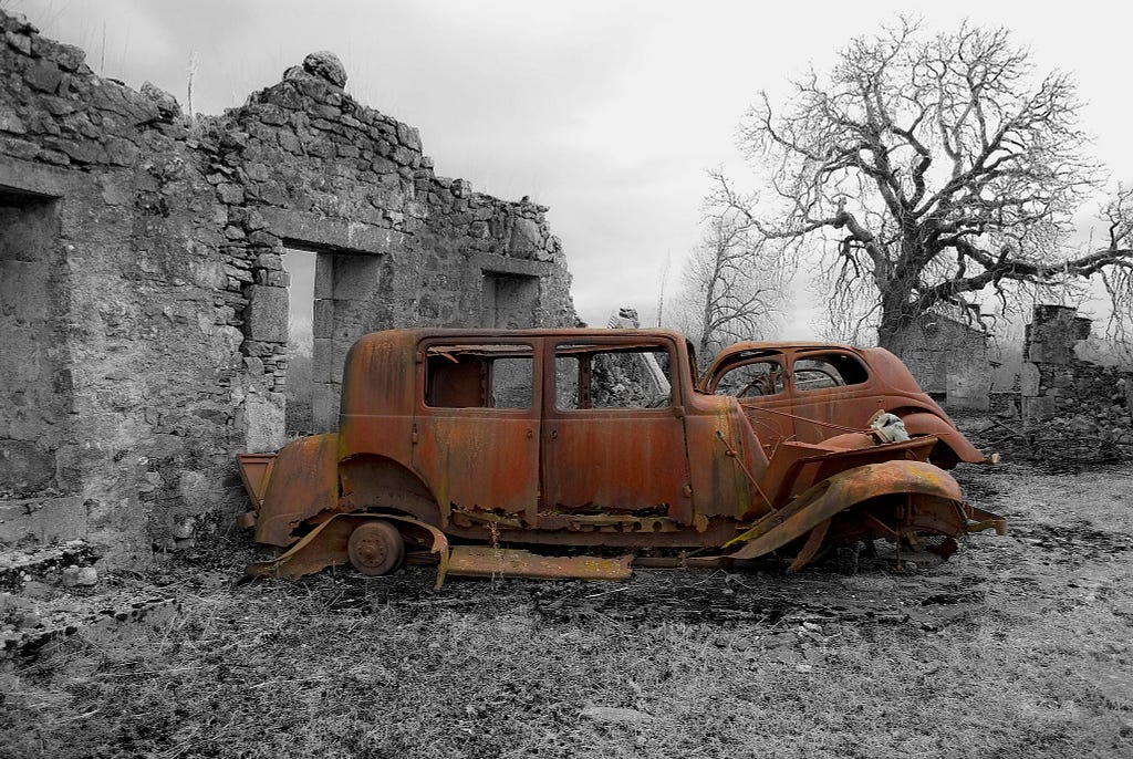 Rusted Out Cars at Oradour-sur-Glane-Photo by Keith Ellwood