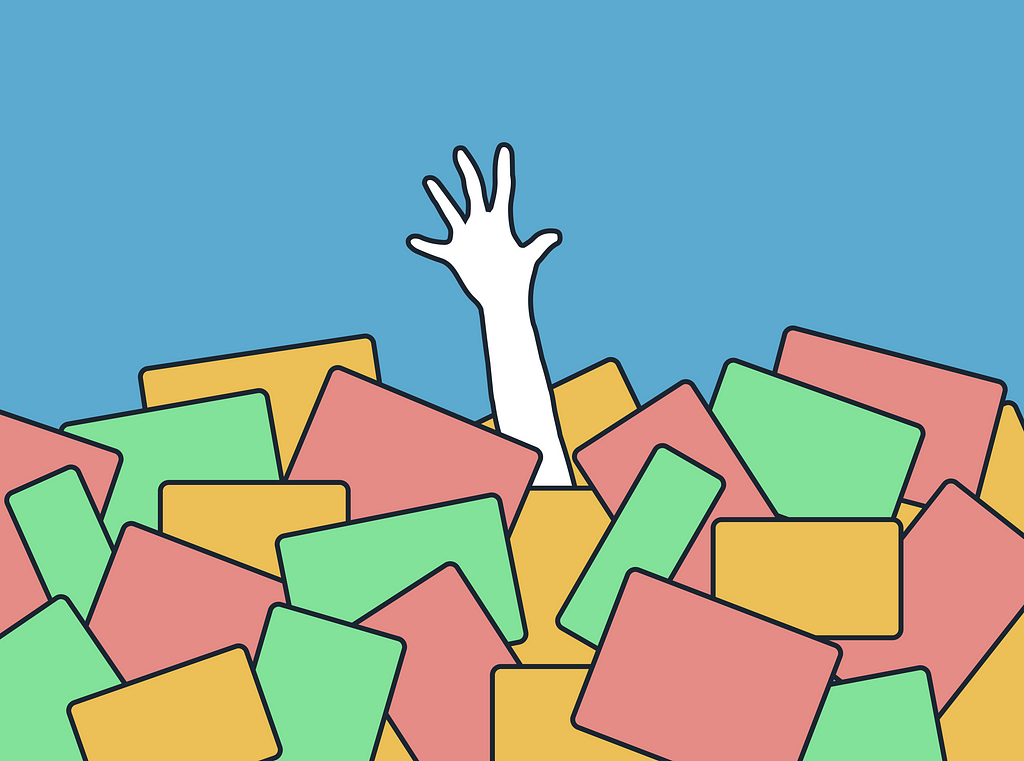 A single hand reaches upward from a jumble of boxes, representing an individual in need of assistance.