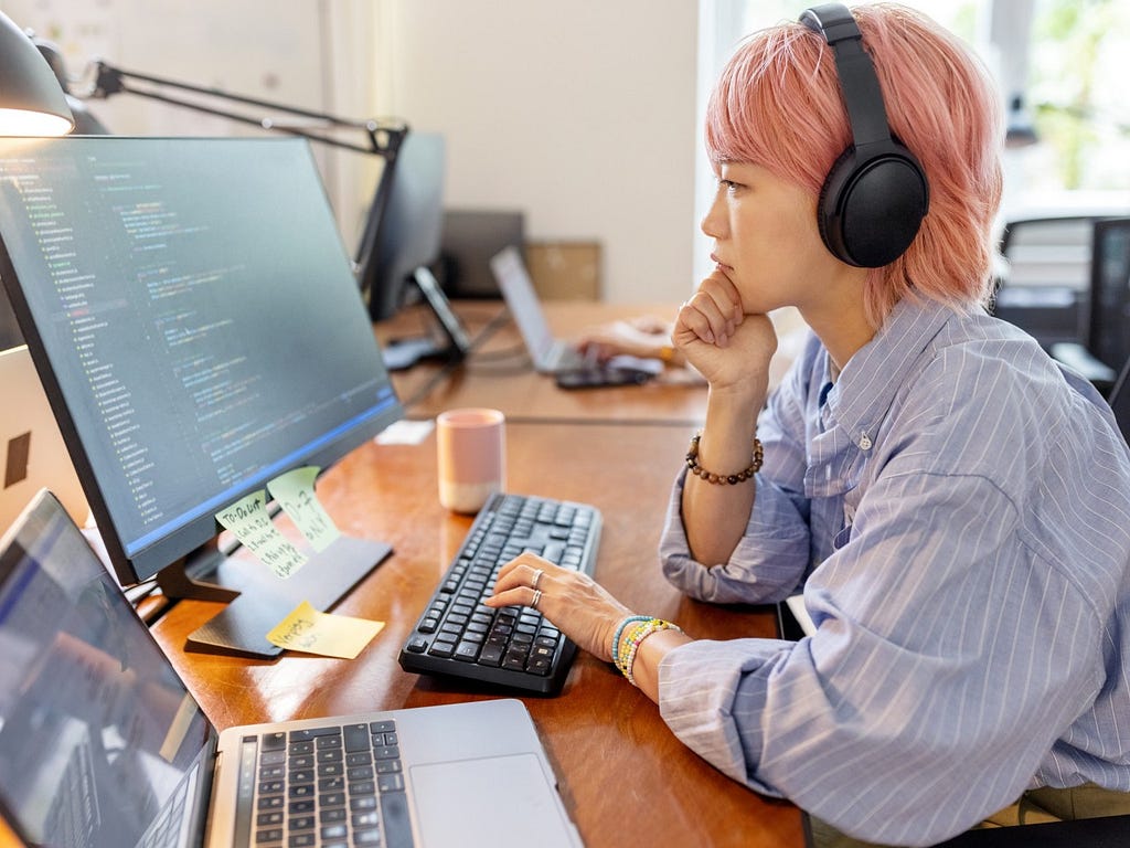 Open Source Developer at her Workstation