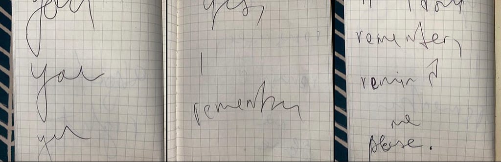 scribbled handwriting in notebook