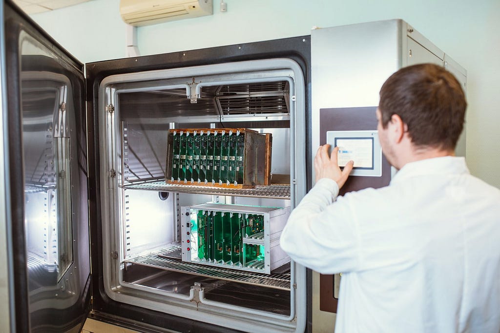 PCBs are receiving temperature treatments as a test of their reliability and durability. The heat chambers they go in are essentially industrial ovens