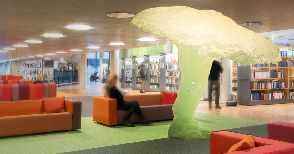 Image of a constructed breathing tree in paper added to an image of the Södertörn University library.