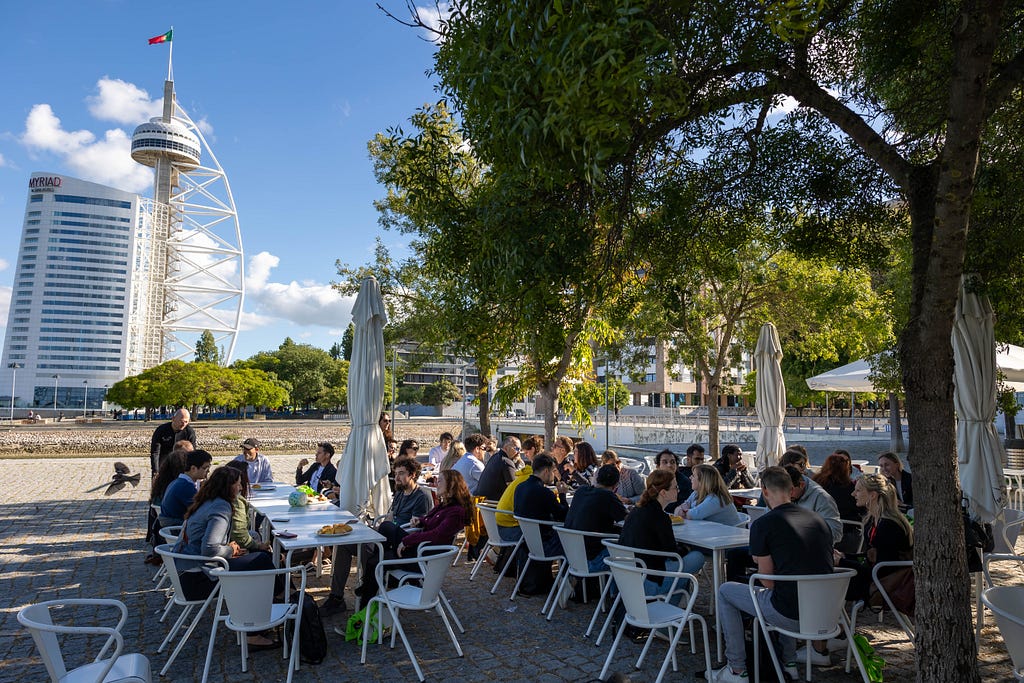 Attendees sitting  in Esplanando’s terrace.