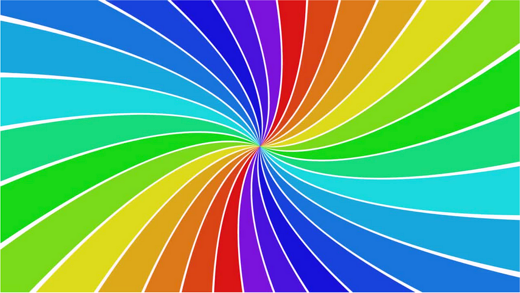Picture is of spiral wheel with varying colors of the rainbow with caption that says Colors play a clear role in the way we perceive our surroundings & how we directly interact with them.