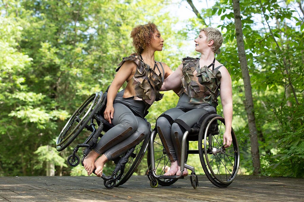 Alice and Laurel at Jacob’s Pillow: With their arms interlocked, Laurel Lawson gazes toward Alice Sheppard.