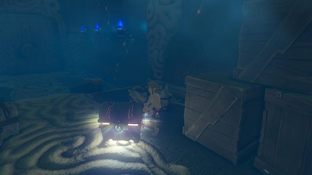 Link in the Shrine of Resurrection grasping his toe after kicking a treasure chest barefoot.
