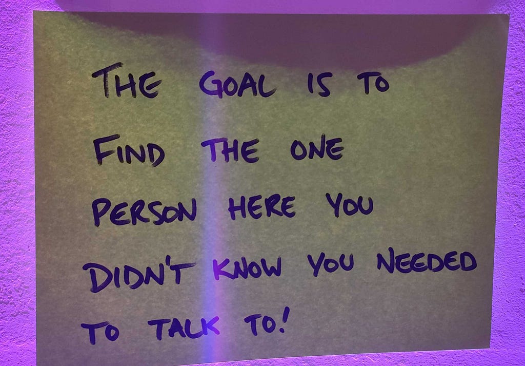 Post-it from the unconference which says “The goal is to find the one person here you didn’t know you needed to talk to!”