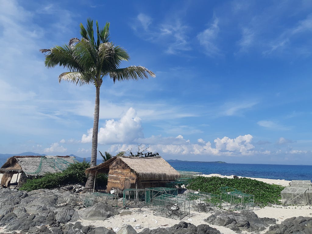 An image of a hut on an island