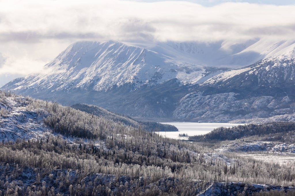 A snowy, mountainous winter landscape.